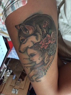 fuckyeahtattoos:  My lady wolf is inspired by Sansa Stark, my favorite character in the ASOIAF book series. She was done by Erica Flannes at Red Rocket Tattoo in NYC. If you are ever considering pretty lady head tattoos, or any pretty tattoo for that