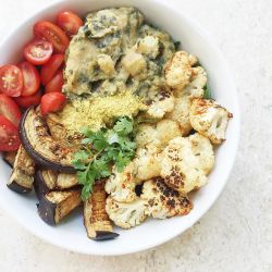 wholeandhealthy:  For lunch today I made a creamy Mesquite Lentil Dal with spinach and parsnip (anyone else obsessed with parsnips?! 😍) over a bed of arugula, and then I roasted cauliflower and eggplant in a red curry sauce, added grape tomatoes and