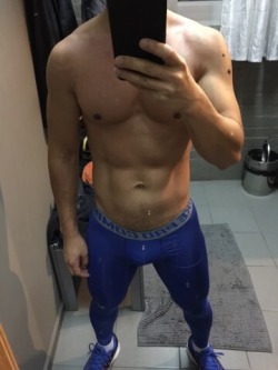 athleticguysandgear:  Blue is my favorite color! And blue is definitely this guy’s color. Hot!