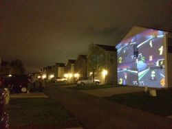 anh-taiii:  heartlessdivine:  whiskey-neat:  My friend just rigged it so she and her friends could play Mario Kart on the side of a house for someone’s birthday.  Now the whole neighborhood can watch as a friendship is blown away by a blue turtle shell