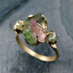 scumbugg:  culturenlifestyle:  Stunning Handmade Raw Organic Gemstone &amp; Precious Metal Jewelry by Angeline Portland based indie boutique By Angeline handcrafts stunning gold rings with rough uncut gemstones. The artist loves to transform metals with