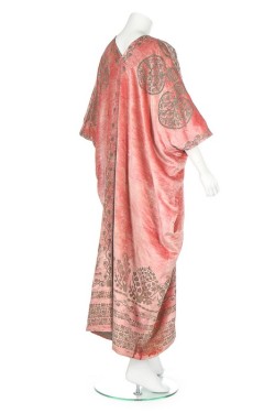 historicaldress:    A Mariano Fortuny stencilled pink velvet mantle, circa 1920Bearing circular label to lining, printed in gold with scrolling vine and stylised tree motifs, with side slits forming armholesKerry Taylor Auctions