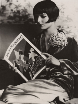 Louise Brooks reading Theatre Magazine (1927). Photograph by Eugene Richee