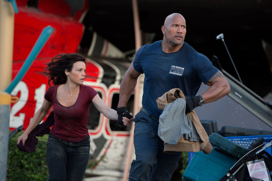 The Rock and Carla Gugino in San Andreas