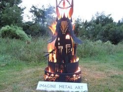 nerdsandgamersftw:    Barad-dûr Fire Pit Handmade item  Approximately 5 foot high and 2 foot wide base made from heavy gauge steel Materials: metal, steel, fire, firepit Created by Trevor McIntyre of Image Metal art | Available via Etsy 