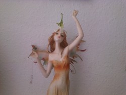Offerings to faery Lenaia: bark, aqua marine,quarz,coral,flower,wand made with stem,shell.