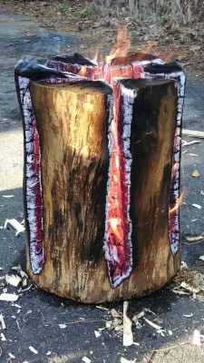 fortheloveofcamp:  h-o-r-n-g-r-y:  ciderandsawdust:  Our first attempt at a Swedish fire log was a smashing success.  burns for hours and it looks beautiful.  also put a pot on top and cook on it!