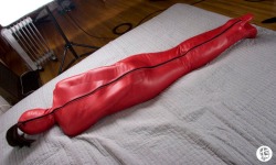putmeinherplace:  This wonderful sleepsack is the work of the Fetish LeatherCrafter. Check his blog for more marvelous kinky leather. He even has patterns to download if you want to try to make your own gear. I was particularly interested by the pattern