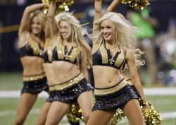 sports-babes:  New Orleans Saints cheerleaders the Saintsations shaking pom poms and rocking bikinis prior to their NFL playoff showdown with the Seahawks.  2 persons I would love 2 meet