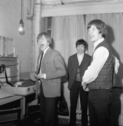 goo-goo-gjoob-goo-goo:   A jolly Brian Jones pictured with  (from left to right; Bill Wyman and Mick Jagger)    Photo by Chris Ware &gt;