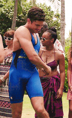 davidmuhn:  Zac Efron in tight singlet showing bulge gif