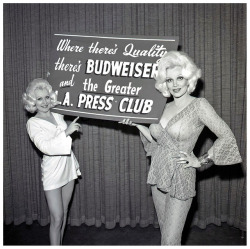 Liz Renay (at Right) and friend pose for photos promoting the L.A. Press Club.. A group of reporters that would host a semi-annual social event, for it’s membership, &ndash; often, featuring Los Angeles area strippers in perfomance..