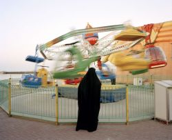 unrar:  Bahrain, Manama seafront, 2004, Chris-Steele Perkins. 
