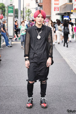 tokyo-fashion:  21-year-old Japanese fashion student Ryo on the street in Harajuku with pink hair and piercings, a Comme Des Garcons top, Dr. Martens boots, and accessories by Vivienne Westwood and Chrome Hearts. Full Look