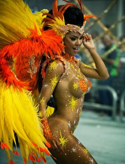 Naked woman in body paint at a Brazilian carnival.