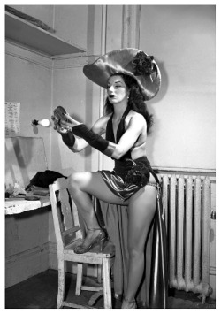 Vivienne Morgan      aka. “The Lady From Park Avenue”.. Vintage photo from 1952 features Vivienne touching up her makeup in a Backstage dressing room..