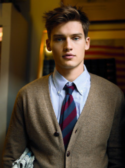 ivy-league-style:Light blue striped oxford cloth button-down shirt, brown wool cardigan, regimental tie. Ivy style: check
