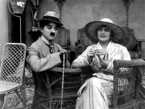 chaplin-images-videos:Charlie Chaplin &amp; Edna Purviance - The Cure (1917) https://painted-face.com/