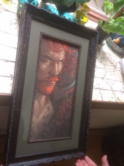 Framed print of flame-haired Pirate Captain Flint of Black Sails. Thanks Mimmu.net (nirnalie) for creating such beautiful artwork!  Photos don’t reflect the details of the rough yet ornately rendered wooden frame (ships) which up close looks like morse