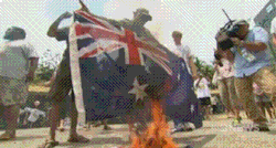 kropotkindersurprise:  2014 - Aboriginal activists burn the Australian flag [video] 