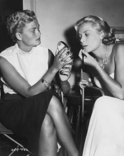 thefashioncomplex:  Grace Kelly and her sister Lizanne on the set of To Catch a Thief, circa 1954 