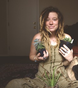 dreadheaven:  Proud new succulent momma and freshly washed dreads curling around each other! accalia-spirit.tumblr.com