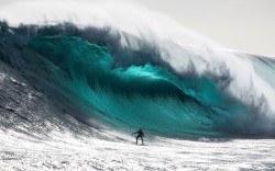 Teal toned tunnel (Australian surfer Marti Paradisis on a wave near Pedra Branca Rock, south of Tasmania. Paradisis won the “Biggest Wave” competition of the Australasian Big Wave Awards ~ Nov 2012)