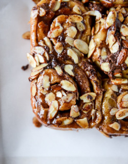 sweetoothgirl:  nutella sticky buns with toasted almonds and nutella caramel  