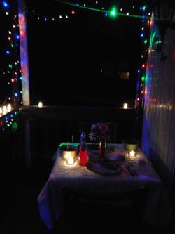 This is what my fiance surprised me with when I got home from work last night. a candlelight dinner out on my front porch, with Christmas lights surrounding us. She made me Steak, green beans, biscuits, and mash potatoes. This is like a dream come true.