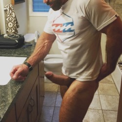 homopower:  To be bent over, leaning on the counter in front of him!