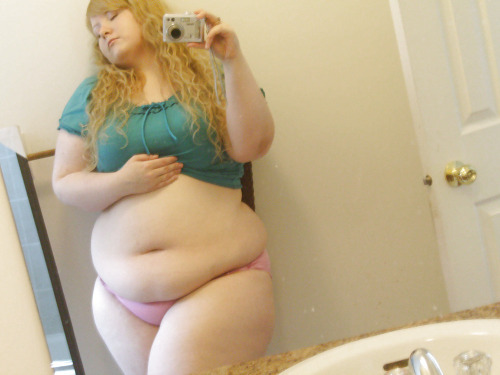 Naked chubby girl with muffin top