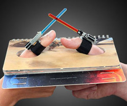 awesomeshityoucanbuy:Lightsaber Thumb WrestlingDo battle at the highest of levels when you square off with an opponent at lightsaber thumb wresting. The mini lightsabers attach to the thumb via velcro to provide a more civilized way of dueling with the