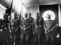 Himmler, Lutze, Hitler, Hess and Streicher. The second row includes von Ribbentrop, Brueckner and Schaub - 1935