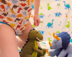 minimaxkiddo:  xorcub:  Um, I don’t know… Dinomania!I know I should get some dino socks too. Wander what other dino stuff I could find?(Onsie from JayKayBaby)  Super cute ^^