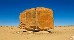 coolthingoftheday:  Despite having the appearance of being perfectly cut down the middle as by a man-made instrument, the Al Naslaa Rock Formation in Tayma, Saudi Arabia is actually completely natural. (Source)