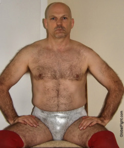 wrestlerswrestlingphotos:  gay prowrestler sitting skimpy tight outfit