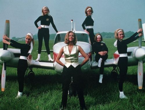 Honor Blackman.  Pussy Galore and her flying circus Nudes &amp; Noises  