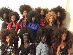 blackgirlsinlove:  blackgirlorangemind:superglued-promises:pinnockalicious:imclairebear903:Black barbies.  the one in the lower left corner is serving beyonce as foxy cleopatra realness   But I like how there’s different shades and not just one standard