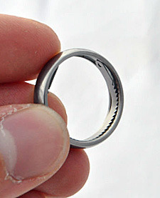 stoicbushido:  maxlibertarios:  thebourbonrebellion:  survivetheinfection:  A titanium escape ring with a handcuff shim and a saw blade hidden inside, the shim can open single lock handcuffs and the saw blade can cut through zipcuffs, duct tape, and other