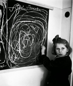 sixpenceee:  Tereszka who grew up in a concentration camp was asked to draw “home” and what she drew was scribbles. It shows how the horrors of the concentration camp warped her mind. This photograph was taken by David Seymour in 1948. 