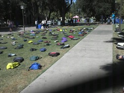 kimlundgren:  neilsenad:  My college did this thing today where they laid out the backpacks of students who have committed suicide. This is just a small portion of some of them. On top of the backpacks was a brief summary of who they were. Some backpacks