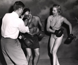 Weegee - Posing boxing match models, 1950s.