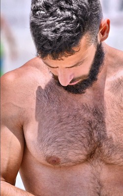 stratisxx:  Sexy greek daddy at the beach… up close.
