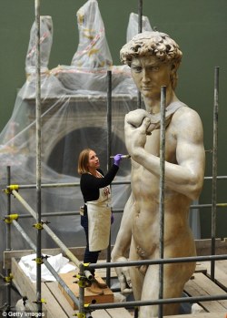 hismarmorealcalm:  The Victoria and Albert Museum’s sculpture conservator Johanna Puisto works on giant plaster cast of statue of David 