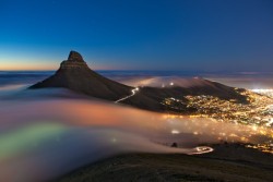 The fog comeson little cat feet.It sits lookingover harbor and cityon silent haunchesand then moves on.– Carl Sandburg(Fog over Cape Town, South Africa)