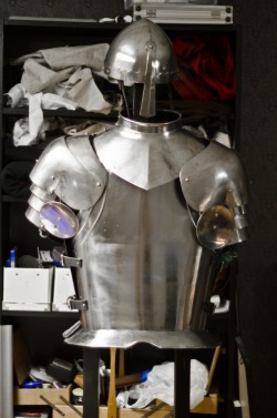 I finally got around to building a stand for my armor. It is slowly coming together - I need to put a hammer to the cuirass, however. Damn thing looks the same back and front.