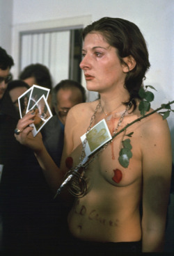 thefeministobserver:  radagastlovesyou:  nostomaniac:   Marina Abramović, Rhythm 0, 1974  “This piece was primarily a trust exercise, in which she told viewers she would not move for six hours no matter what they did to her.  She placed 72 objects