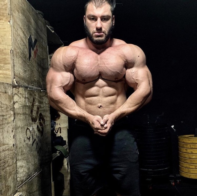 Dan Cristian - His chest and shoulders are at war with his skin and winning. 