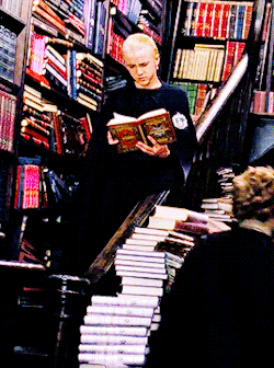 fuzzykitty01: fangirltothefullest:  indie-band:  NO BUT DO YOU WANT TO HEAR MY THEORY FOR THIS SCENE This doesn’t comply with the books, I realize, but it doesn’t exactly not comply either. Why would Malfoy rip a page out of a random book? If he wanted