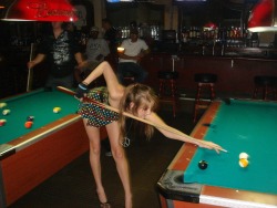 peepys-roadrunner:  Your wife seems to be drawing the attention of some admirers while shooting pool.  I think the mini skirt sans panties may have something to do with it!  flash-public: What panty? If we go out&hellip; frivol.. she wearing never a